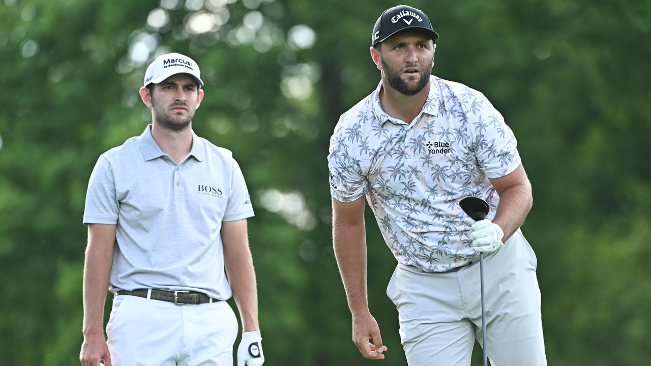 DUBLIN, OHIO - JUNE 05: Jon Rahm of Spain watches his drive on the 18th tee box as Patrick Cantlay watches during the third round of the Memorial Tournament presented by Nationwide at Muirfield Village Golf Club on June 5, 2021 in Dublin, Ohio.