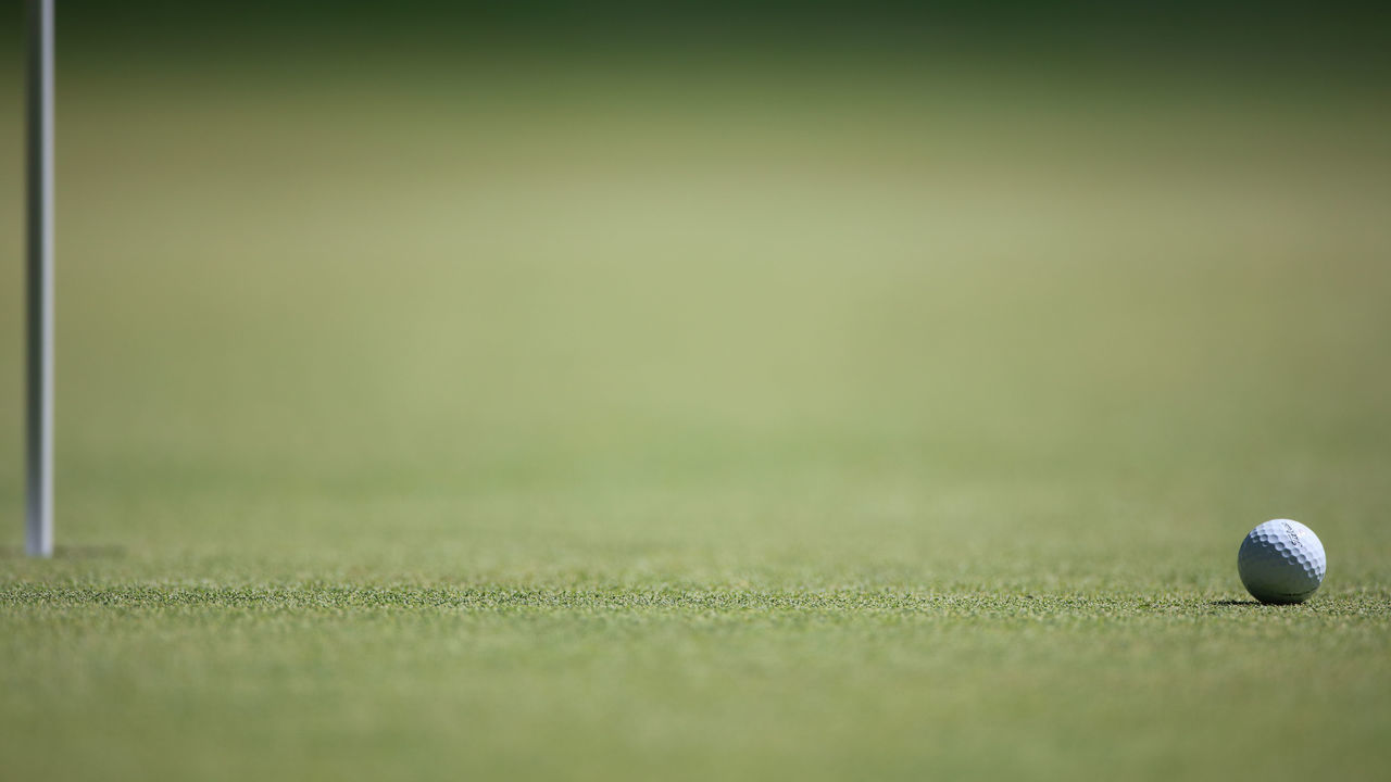 CROMWELL, CONNECTICUT- June 24: A generic image of a golf ball near the pin during the Travelers Championship Tournament at the TPC River Highlands Golf Course on June 24th, 2017 in Cromwell, Connecticut.