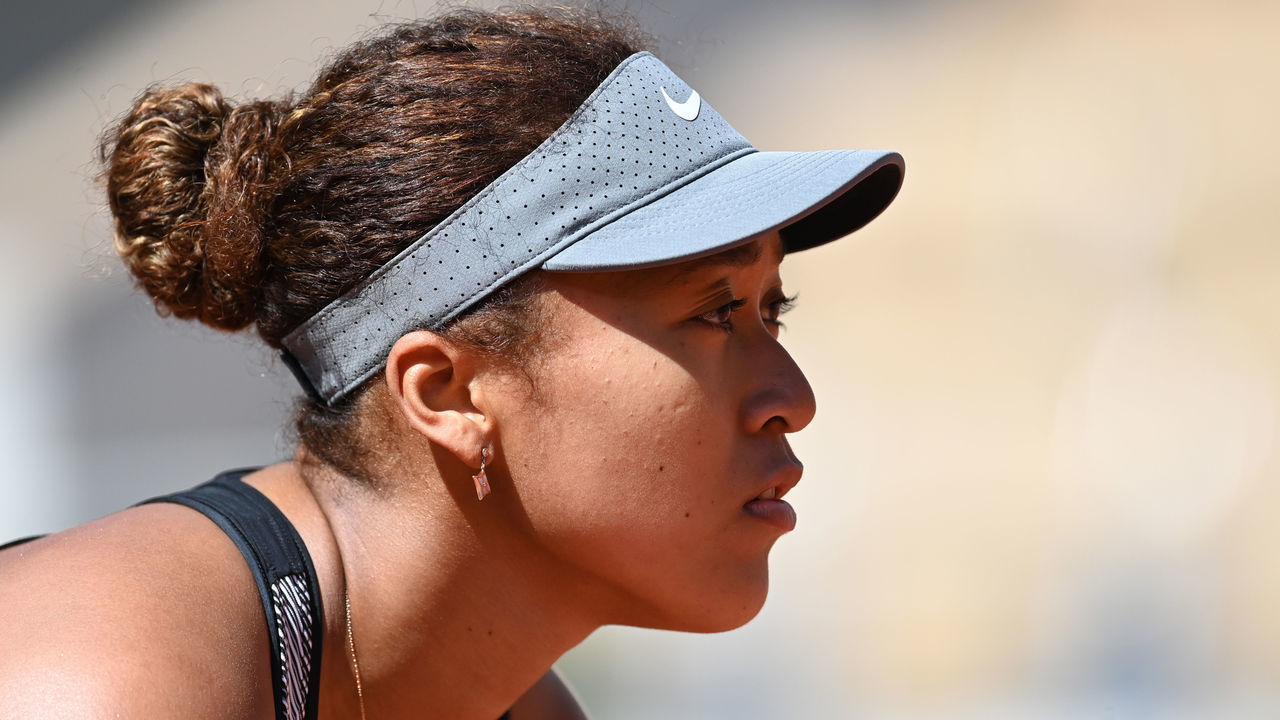 PARIS, FRANCE - MAY 30: Naomi Osaka of Japan in action against Patricia Maria Tig (not seen) of Romania in the first round of the women singles during the French Open Tennis Tournament at Roland Garros in Paris, France on May 30, 2021.