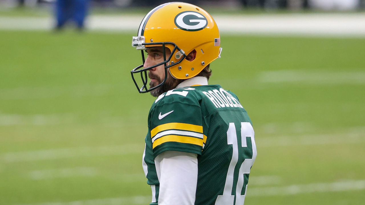 GREEN BAY, WISCONSIN - JANUARY 24: Aaron Rodgers #12 of the Green Bay Packers warms up before the NFC Championship game against the Tampa Bay Buccaneers at Lambeau Field on January 24, 2021 in Green Bay, Wisconsin.