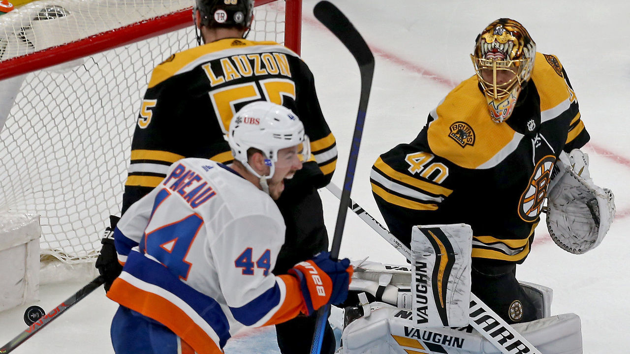 Boston, MA. - June 7: Tuukka Rask #40 of the Boston Bruins and Jeremy Lauzon #55 of the Boston Bruins look back at the puck as Jean-Gabriel Pageau #44 of the New York Islanders celebrates Mathew Barzal"u2019s goal during the first period of Round Two, Game Five of the Stanley Cup Playoffs at the TD Garden on June 7, 2021 in Boston, Massachusetts. (Staff Photo By Matt Stone/MediaNews Group/Boston Herald)