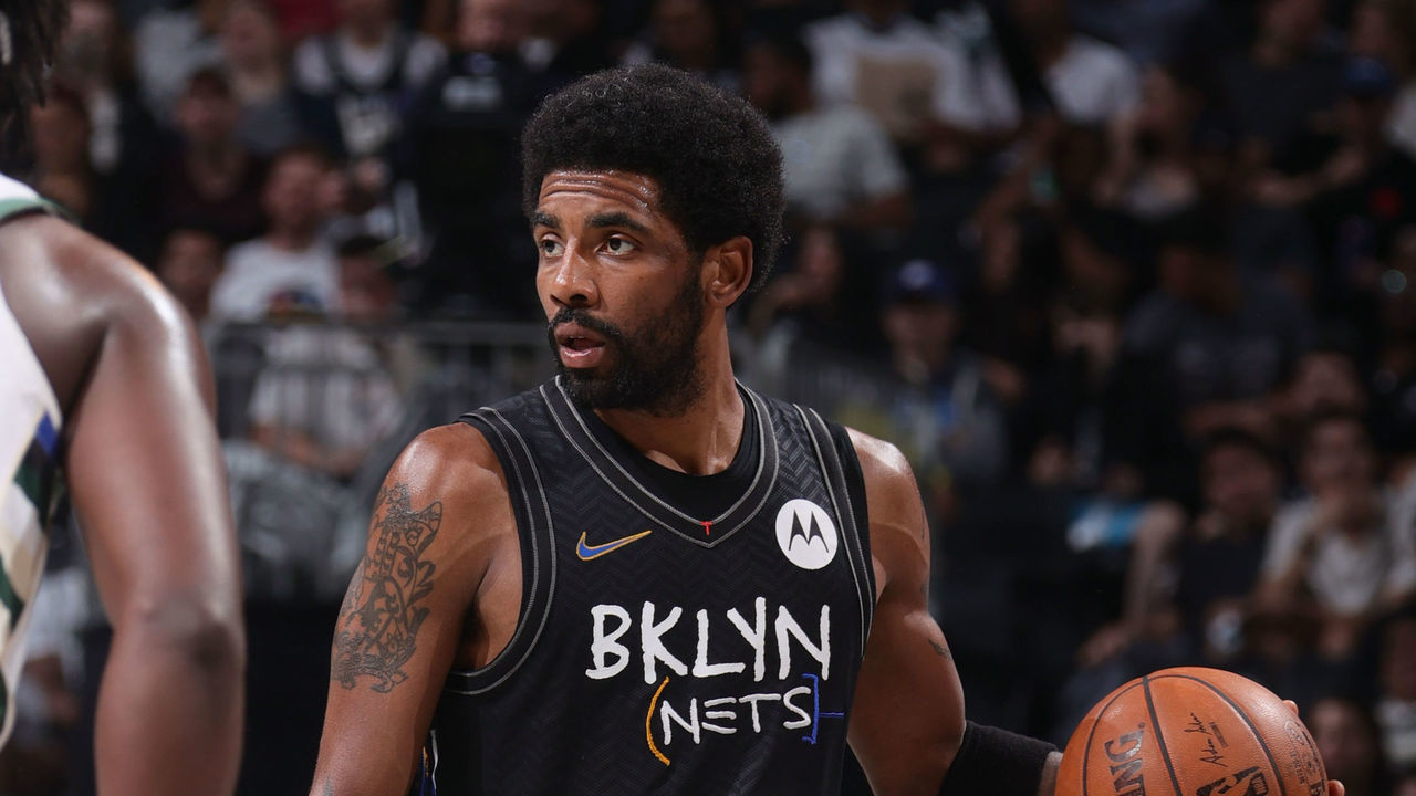 BROOKLYN, NY - JUNE 7: Kyrie Irving #11 of the Brooklyn Nets dribbles the ball against the Milwaukee Bucks during Round 2, Game 2 of the 2021 NBA Playoffs on June 7, 2021 at Barclays Center in Brooklyn, New York. Mandatory Copyright Notice: Copyright 2021 NBAE