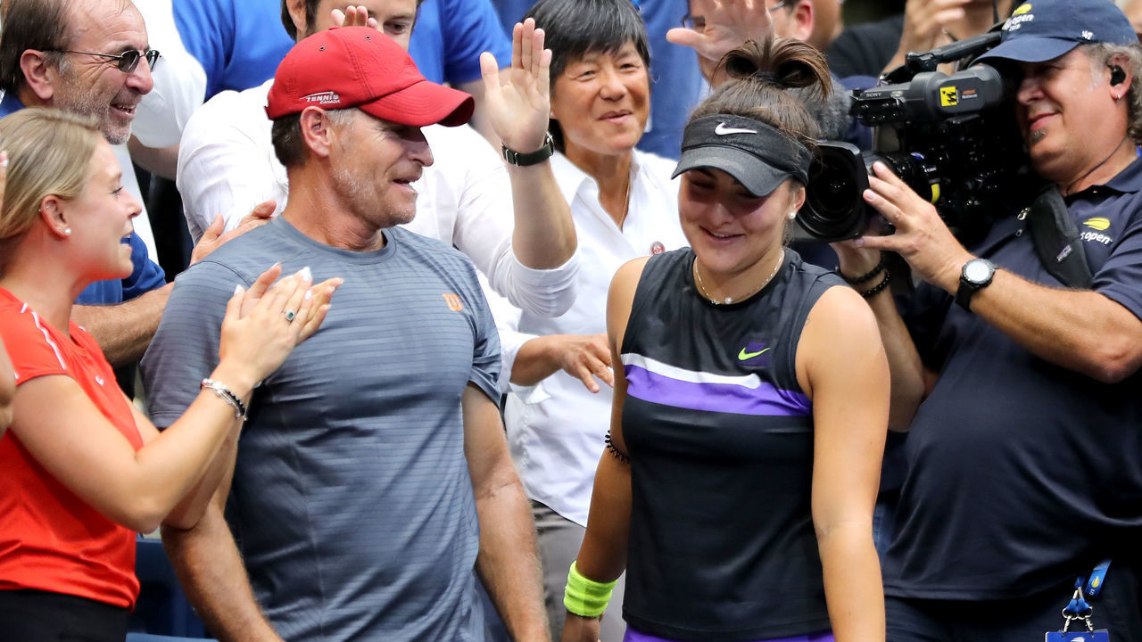 NEW YORK, NEW YORK - SEPTEMBER 07: Bianca Andreescu of Canada celebrates with coach Sylvain Bruneau after winning the Women's Singles final against Serena Williams of the United States on day thirteen of the 2019 US Open at the USTA Billie Jean King National Tennis Center on September 07, 2019 in the Queens borough of New York City.