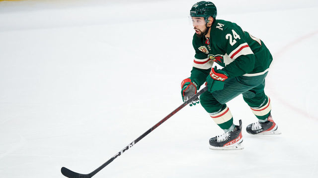 ST PAUL, MINNESOTA - APRIL 17: Matt Dumba #24 of the Minnesota Wild controls the puck against the San Jose Sharks during the game at Xcel Energy Center on April 17, 2021 in St Paul, Minnesota. The Wild defeated the Sharks 5-2.