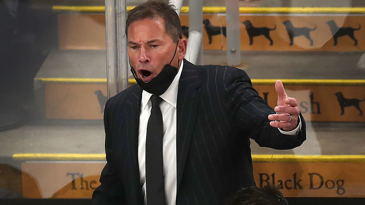 Boston - June 7: Bruins Coach Bruce Cassidy is upset at the refs on a slashing penalty on Boston Bruins center Sean Kuraly (52). The Boston Bruins host the NY Islanders in the NFL East 2nd round, Game 5 at TD Garden in Boston on June 7, 2021.