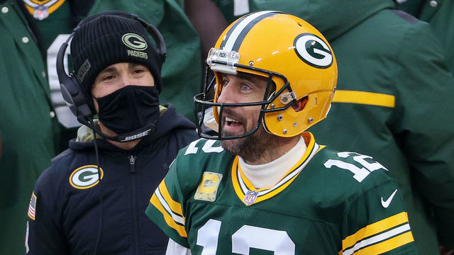 GREEN BAY, WISCONSIN - NOVEMBER 15: Head coach Matt LaFleur and Aaron Rodgers #12 of the Green Bay Packers celebrate after scoring a touchdown in the second quarter against the Jacksonville Jaguars at Lambeau Field on November 15, 2020 in Green Bay, Wisconsin.