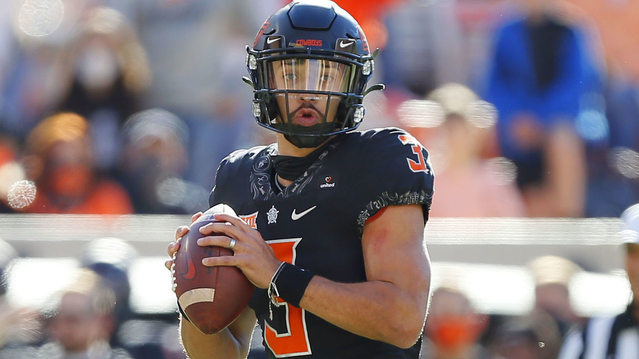 STILLWATER, OK - OCTOBER 31: Quarterback Spencer Sanders #3 of the Oklahoma State Cowboys drops back to pass for a 5-yard touchdown against the Texas Longhorns near the end of the first quarter at Boone Pickens Stadium on October 31, 2020 in Stillwater, Oklahoma. Texas won 41-34 in overtime.