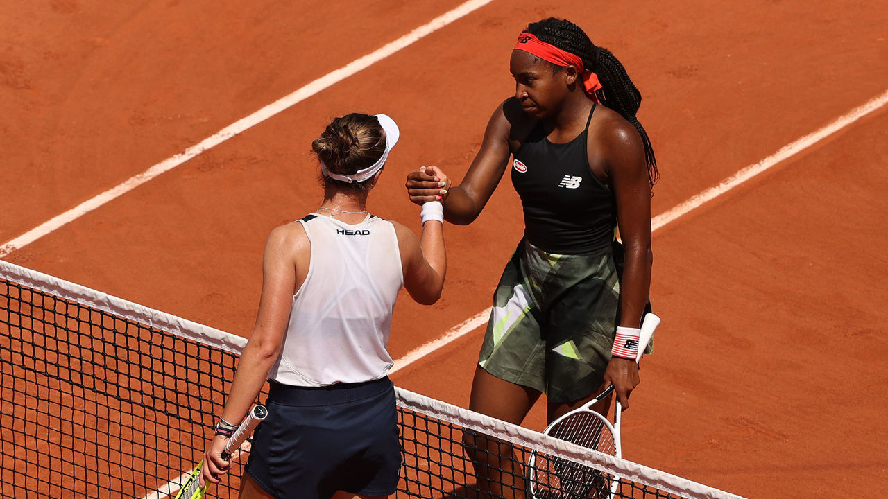 PARIS, FRANCE - JUNE 09: Barbora Krejcikova of Czech Republic interacts with Coco Gauff of The United States at the net after victory in the Ladies Singles Quarter-Final on Day Eleven of the 2021 French Open at Roland Garros on June 09, 2021 in Paris, France.