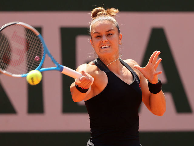 PARIS, FRANCE - JUNE 09: Maria Sakkari of Greece hits a forehand during her Ladies Singles Quarter-Final match against Iga Swiatek of Poland on Day Eleven of the 2021 French Open at Roland Garros on June 09, 2021 in Paris, France.