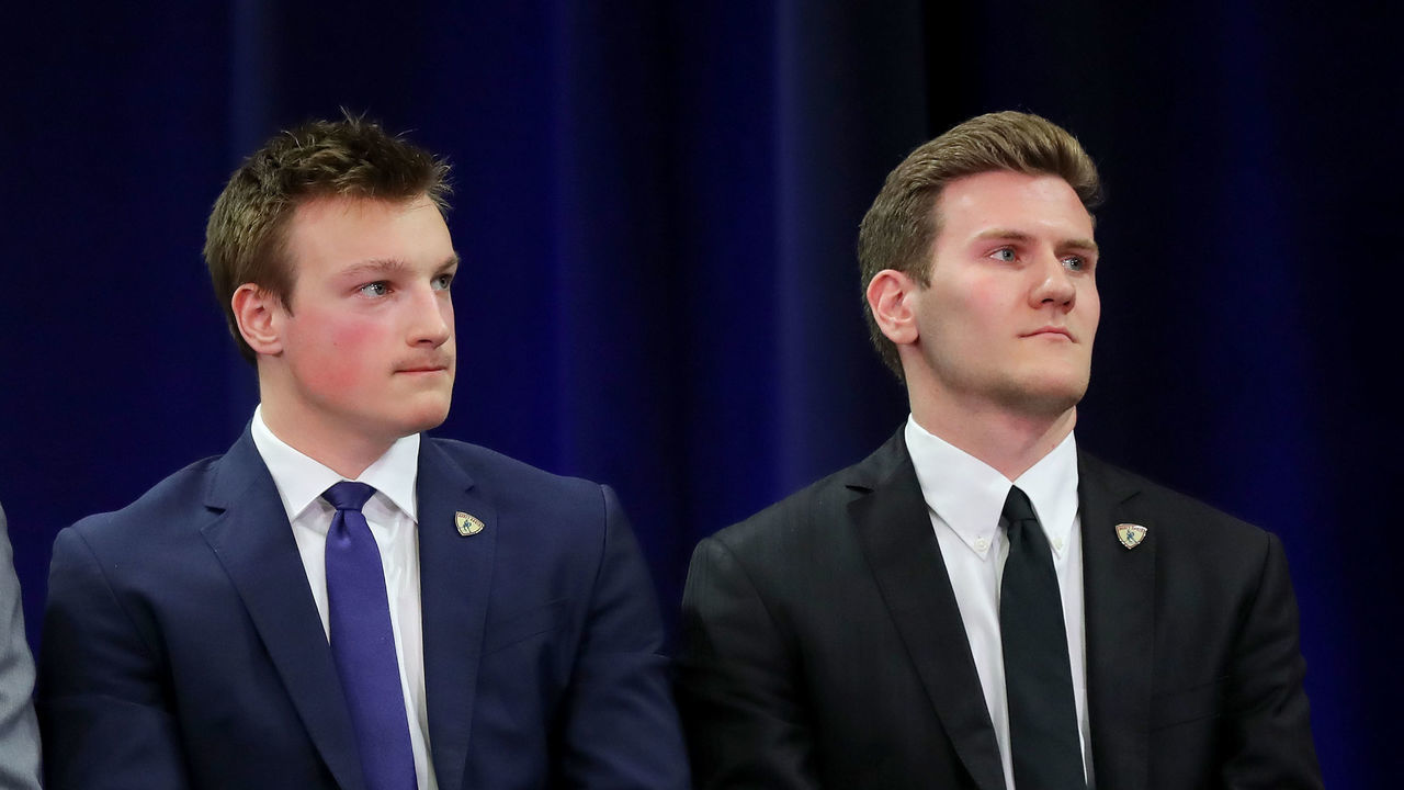 BUFFALO, NEW YORK - APRIL 12: Finalists Jimmy Schuldt of St. Cloud State,Cale Makar of the University of Massachusetts and Adam Fox of Harvard University await the announcement of the winner of the 2019 Hobey Baker Memorial Award during the award ceremony at the Harbor Center on April 12, 2019 in Buffalo, New York.