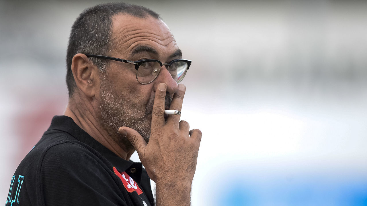 STADIO BRIAMASCO, TRENTO, ITALY - 2017/07/18: Maurizio Sarri, head coach of SSC Napoli, smokes a cigarette prior to the pre-season friendly football match between Carpi FC and SSC Napoli.
