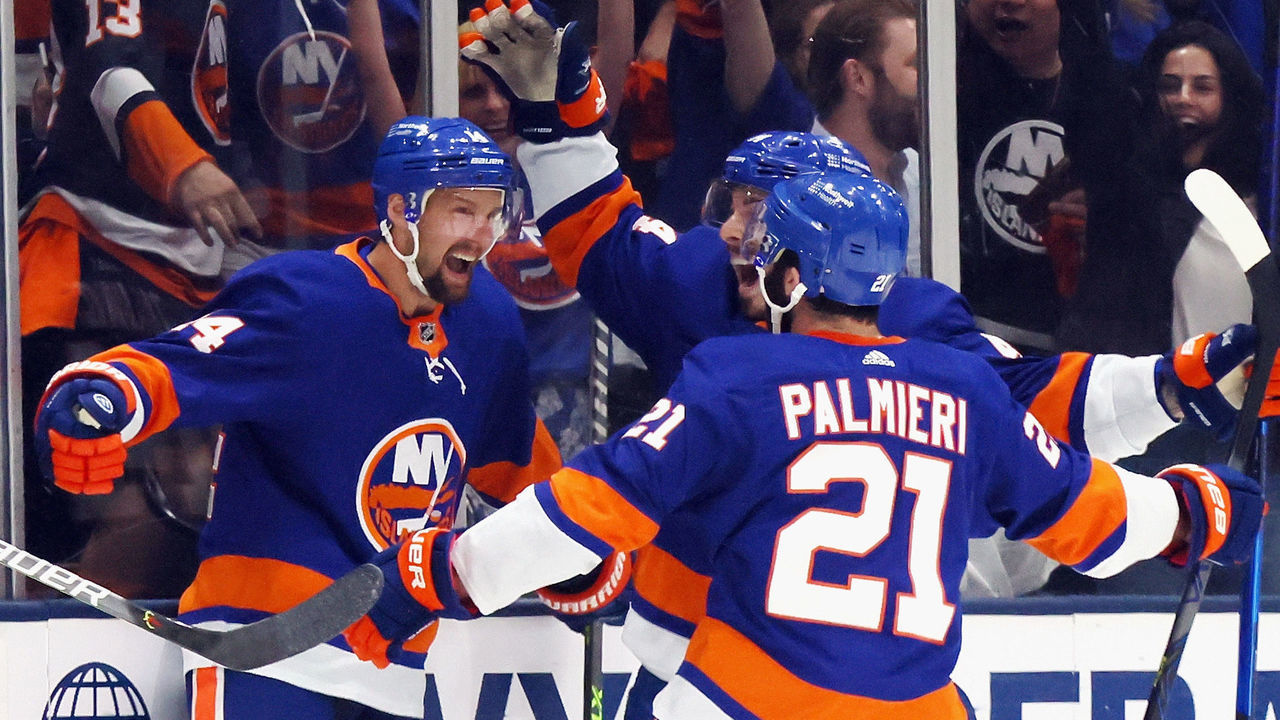 UNIONDALE, NEW YORK - JUNE 09: Travis Zajac #14 of the New York Islanders (L) celebrates his first period goal against the Boston Bruins in Game Six of the Second Round of the 2021 NHL Stanley Cup Playoffs at the Nassau Coliseum on June 09, 2021 in Uniondale, New York.