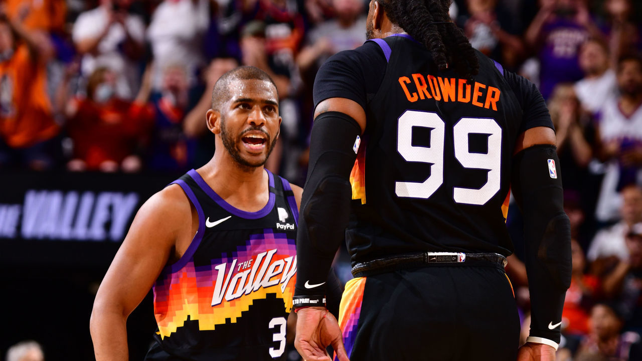 PHOENIX, AZ - JUNE 9: Chris Paul #3 and Jae Crowder #99 of the Phoenix Suns celebrate during Round 2, Game 2 of the 2021 NBA Playoffs on June 9, 2021 at Phoenix Suns Arena in Phoenix, Arizona. Mandatory Copyright Notice: Copyright 2021 NBAE