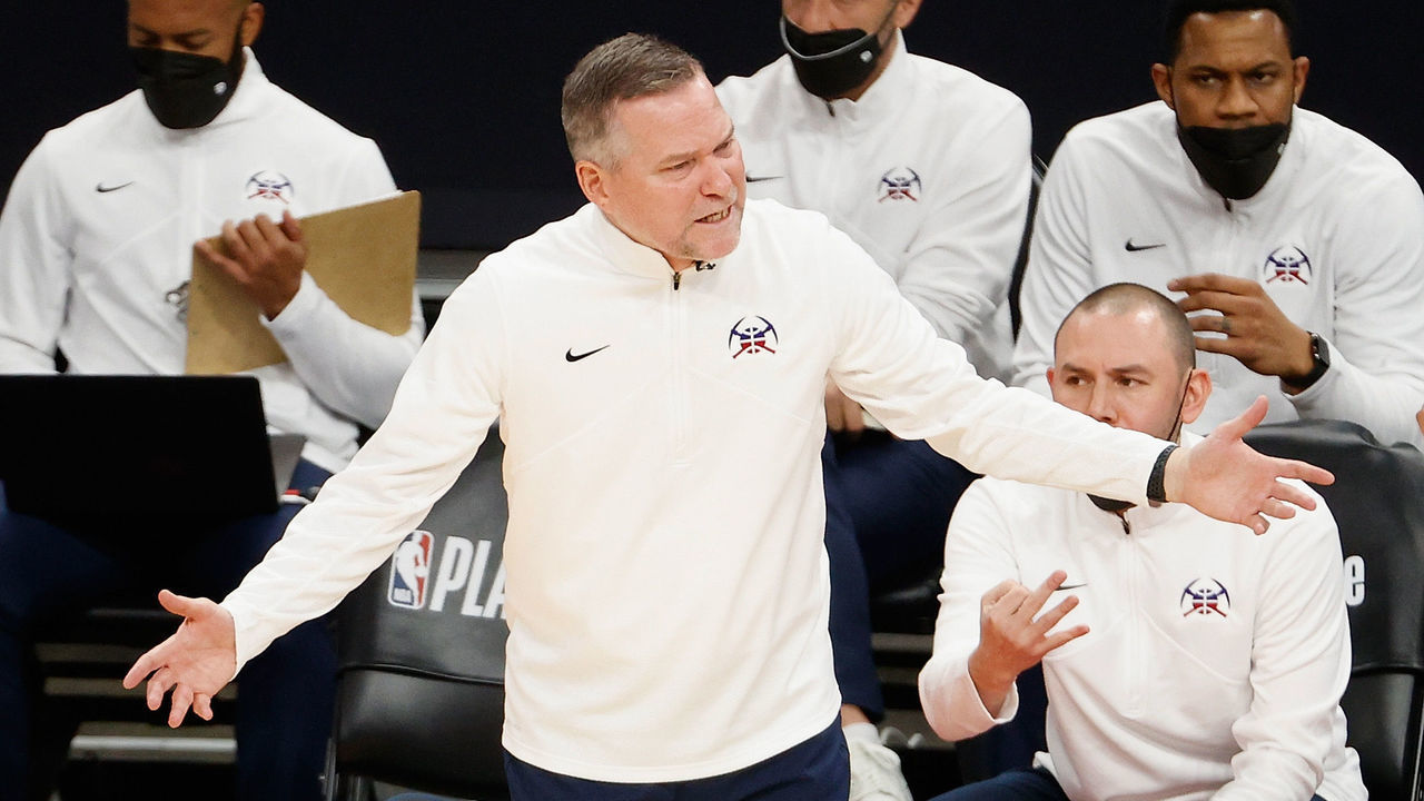PHOENIX, ARIZONA - JUNE 09: Head coach Michael Malone of the Denver Nuggets reacts during the first half in Game Two of the Western Conference second-round playoff series at Phoenix Suns Arena on June 09, 2021 in Phoenix, Arizona.