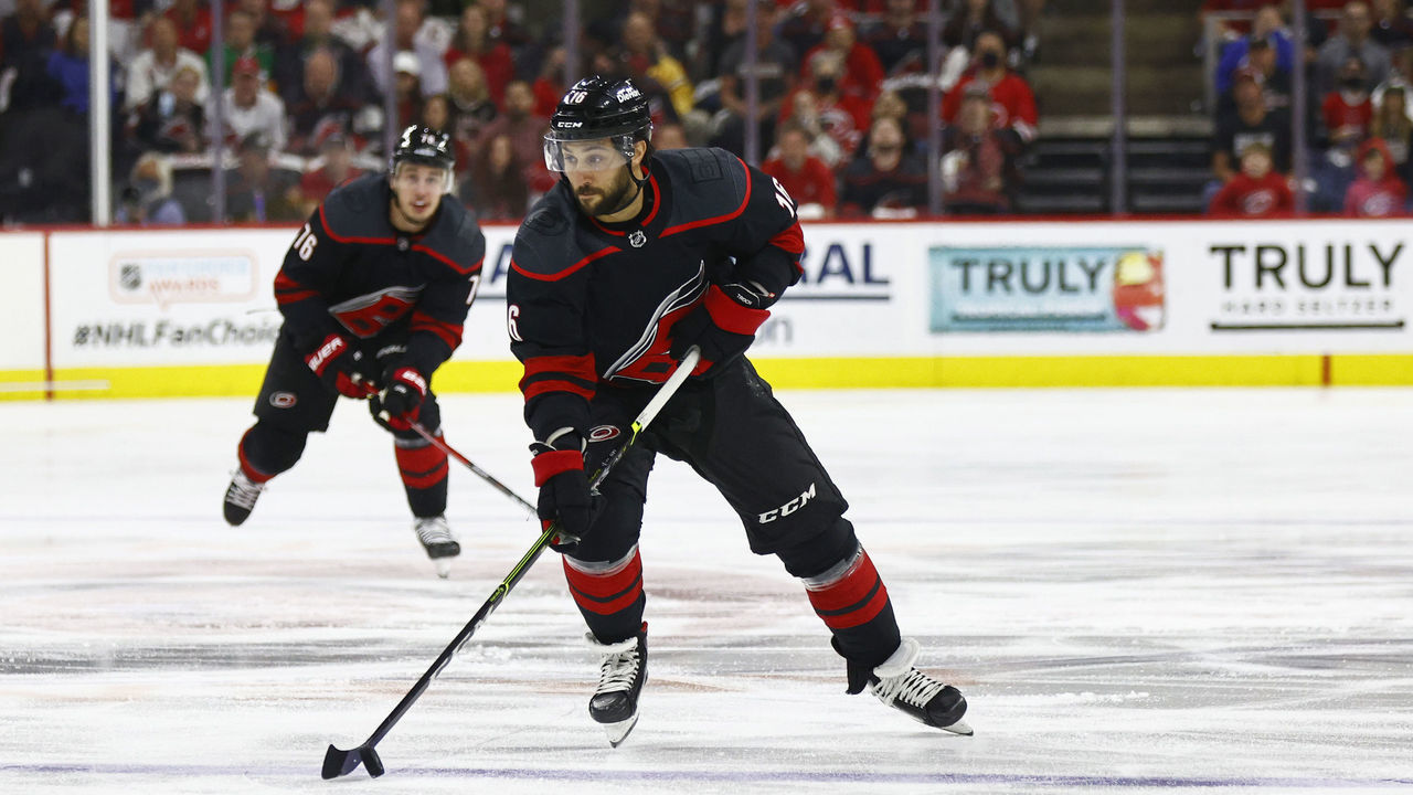 RALEIGH, NORTH CAROLINA - JUNE 08: Vincent Trocheck #16 of the Carolina Hurricanes skates with the puck during the first period in Game Five of the Second Round of the 2021 Stanley Cup Playoffs against the Tampa Bay Lightning at PNC Arena on June 08, 2021 in Raleigh, North Carolina.