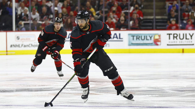 RALEIGH, NORTH CAROLINA - JUNE 08: Vincent Trocheck #16 of the Carolina Hurricanes skates with the puck during the first period in Game Five of the Second Round of the 2021 Stanley Cup Playoffs against the Tampa Bay Lightning at PNC Arena on June 08, 2021 in Raleigh, North Carolina.