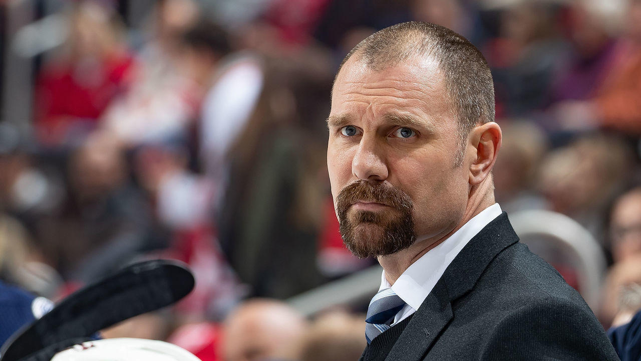 DETROIT, MI - NOVEMBER 26: Assistant coach Brad Larsen of the Columbus Blue Jackets watches the action from the bench against the Detroit Red Wings during an NHL game at Little Caesars Arena on November 26, 2018 in Detroit, Michigan. The Blue Jackets defeated the Wings 7-5.