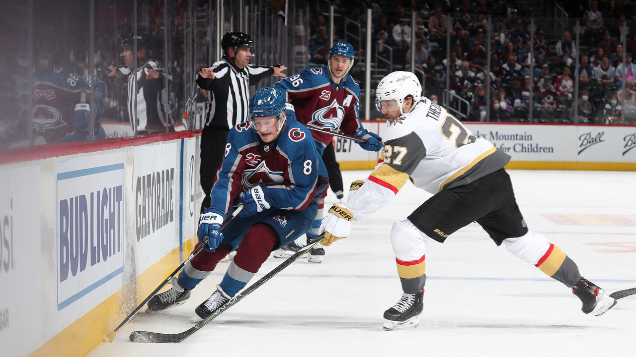 DENVER, COLORADO - JUNE 08: Cale Makar #8 of the Colorado Avalanche skates against Shea Theodore #27 of the Vegas Golden Knights in Game Five of the Second Round of the 2021 Stanley Cup Playoffs at Ball Arena on June 08, 2021 in Denver, Colorado.