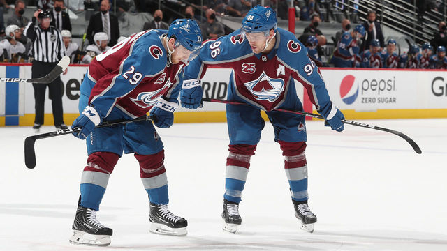 DENVER, COLORADO - JUNE 02: Nathan MacKinnon #29 and Mikko Rantanen #96 of the Colorado Avalanche await a face off against the Vegas Golden Knights in Game Two of the Second Round of the 2021 Stanley Cup Playoffs at Ball Arena on June 02, 2021 in Denver, Colorado.