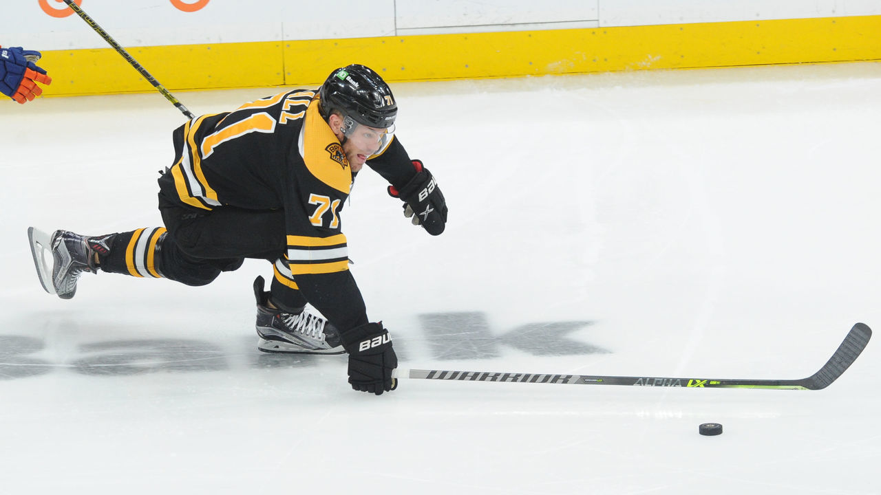 BOSTON, MA - JUNE 7: Taylor Hall #71 of the Boston Bruins skates after the puck against the New York Islanders in Game Five of the Second Round of the 2021 Stanley Cup Playoffs at the TD Garden on June 7, 2021 in Boston, Massachusetts.