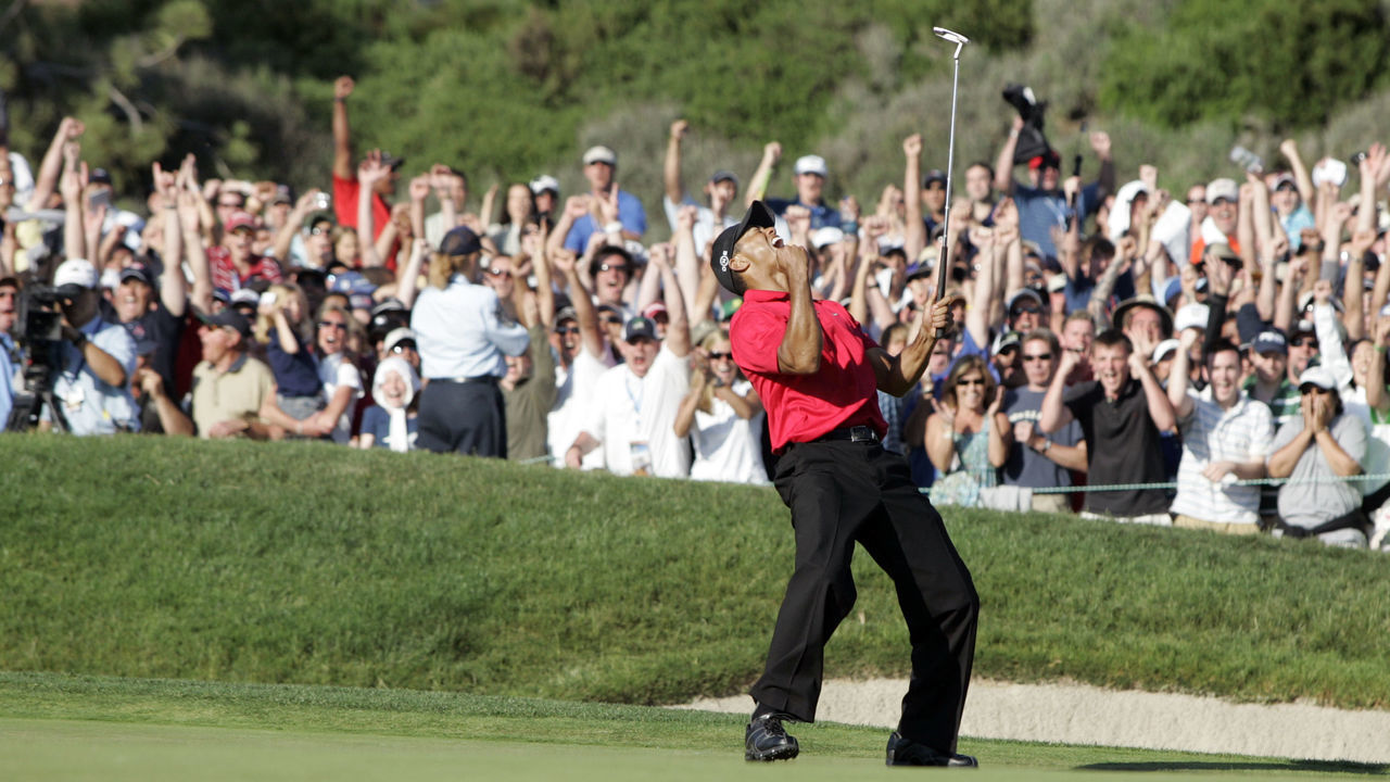 15 June 2008: Tiger Woods birdies the 18th hole and celebrates to send it to a playoff round against Rocco Mediate (not pictured) during the final round of the US Open Championship at Torrey Pines South Golf Course in San Diego, CA.