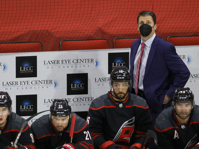 RALEIGH, NORTH CAROLINA - MARCH 04: Head coach Rod Brind'Amour of the Carolina Hurricanes looks on during the third period of their game against the Detroit Red Wings at PNC Arena on March 04, 2021 in Raleigh, North Carolina.