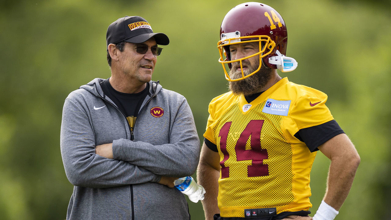 ASHBURN, VA - JUNE 02: Head coach Ron Rivera of the Washington Football Team speaks with Ryan Fitzpatrick #14 during the organized team activity at Inova Sports Performance Center on June 2, 2021 in Ashburn, Virginia.