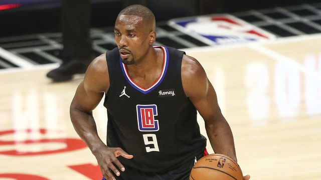 LOS ANGELES, CALIFORNIA - MARCH 11: Serge Ibaka #9 of the Los Angeles Clippers handles the ball during the game against the Golden State Warriors at Staples Center on March 11, 2021 in Los Angeles, California.