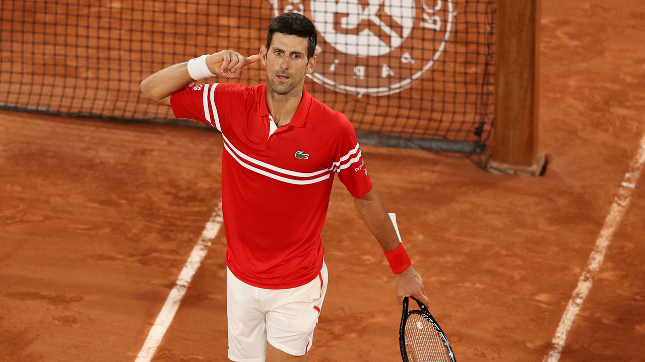 PARIS, FRANCE - JUNE 11: Novak Djokovic of Serbia celebrates to the crowd after winning the third set during his Men's Singles Semi Final match against Rafael Nadal of Spain on day Thirteen of the 2021 French Open at Roland Garros on June 11, 2021 in Paris, France.