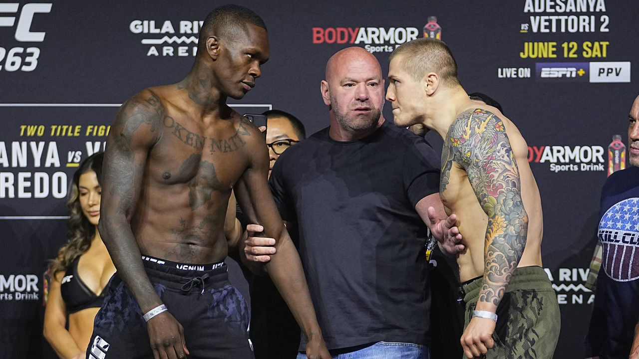 GLENDALE, ARIZONA - JUNE 11: (L-R) Opponents Israel Adesanya of Nigeria and Marvin Vettori of Italy face off during the UFC 263 ceremonial weigh-in at Gila River Arena on June 11, 2021 in Glendale, Arizona.