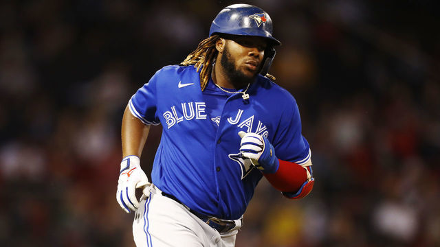 BOSTON, MASSACHUSETTS - JUNE 11: Vladimir Guerrero Jr. #27 of the Toronto Blue Jays rounds first base after hitting an RBI home run at the top of the sixth inning of the game against the Boston Red Sox at Fenway Park on June 11, 2021 in Boston, Massachusetts.