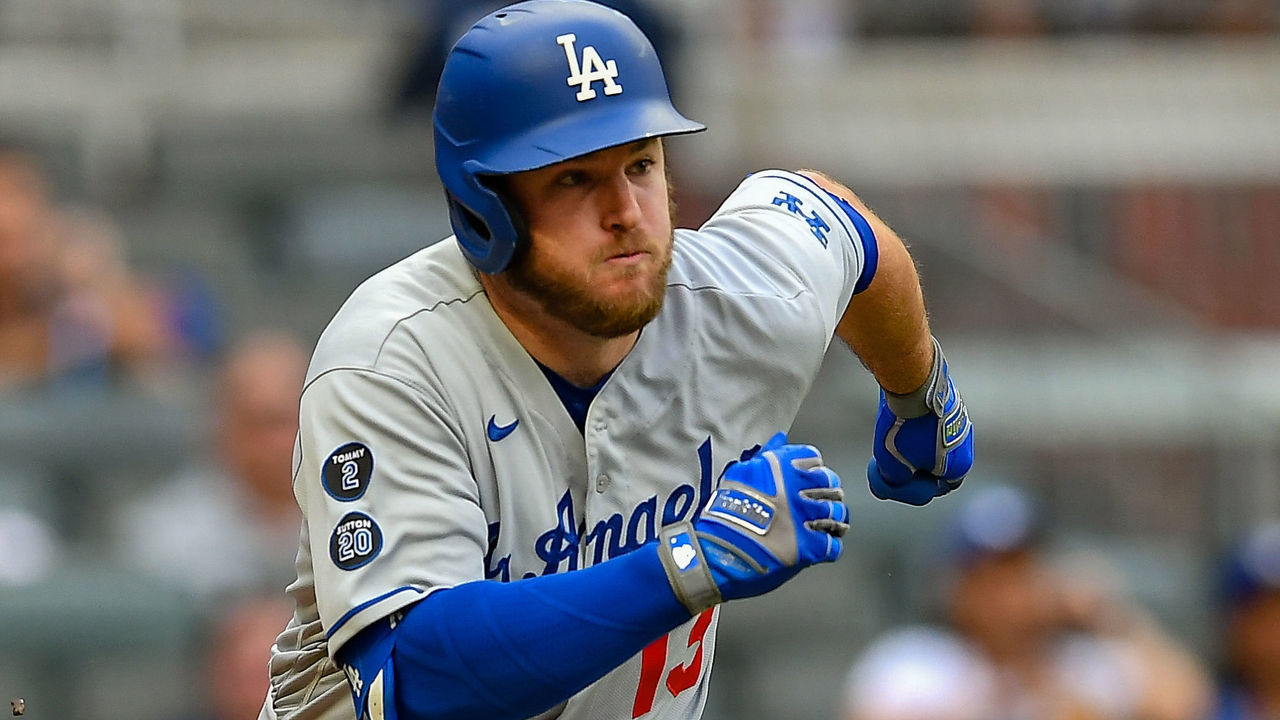 ATLANTA, GA JUNE 04: Los Angeles first baseman Max Muncy (13) hustles to first base during the MLB game between the Los Angeles Dodgers and the Atlanta Braves on June 4th, 2021 at Truist Park in Atlanta, GA.