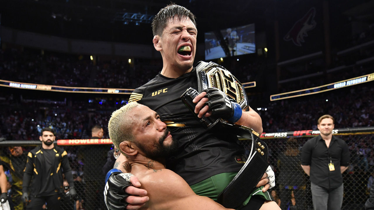 GLENDALE, ARIZONA - JUNE 12: Brandon Moreno of Mexico reacts after submitting Deiveson Figueiredo of Brazil to win the UFC flyweight championship fight during the UFC 263 event at Gila River Arena on June 12, 2021 in Glendale, Arizona.