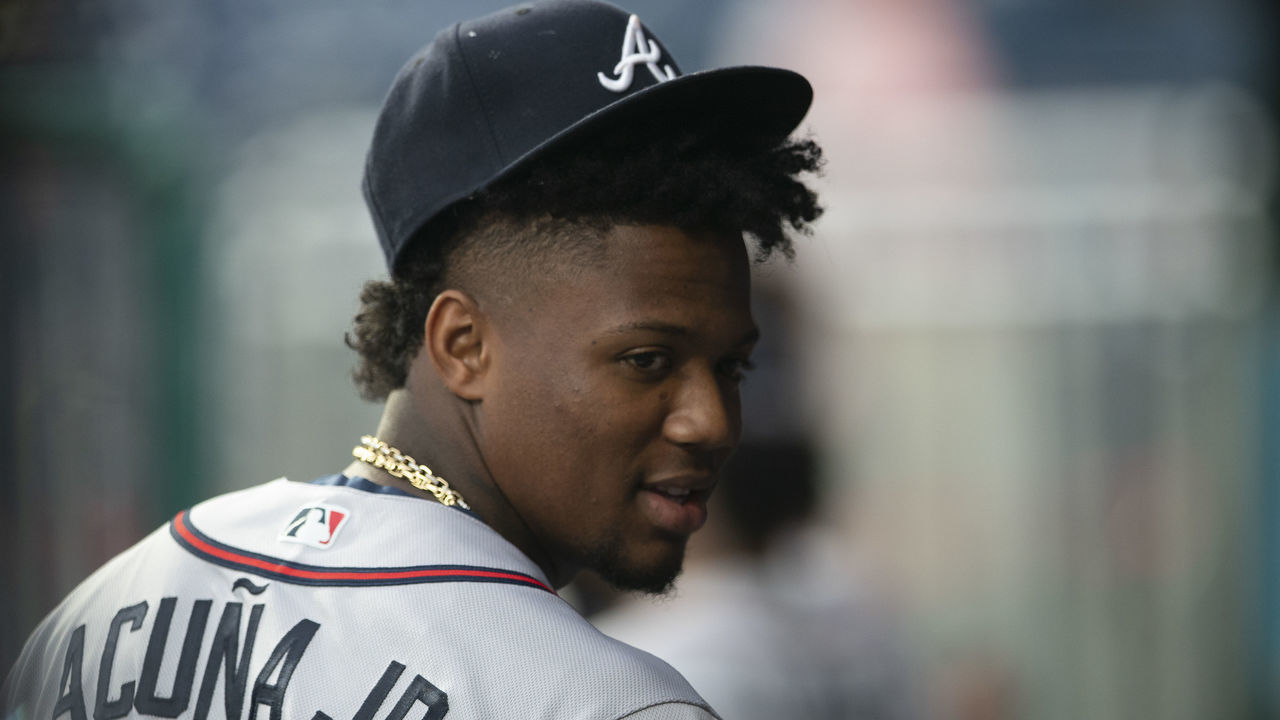 PHILADELPHIA, PA - JUNE 08: Ronald Acuna Jr. #13 of the Atlanta Braves looks on from the dugout against the Philadelphia Phillies at Citizens Bank Park on June 8, 2021 in Philadelphia, Pennsylvania. The Braves defeated the Phillies 9-5.