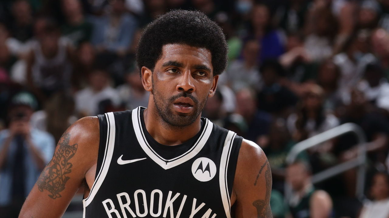 MILWAUKEE, WI - JUNE 13: Kyrie Irving #11 of the Brooklyn Nets looks on during Round 2, Game 4 of the 2021 NBA Playoffs on June 13 2021 at the Fiserv Forum Center in Milwaukee, Wisconsin. Mandatory Copyright Notice: Copyright 2021 NBAE .