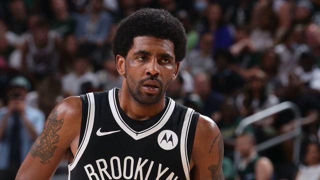 MILWAUKEE, WI - JUNE 13: Kyrie Irving #11 of the Brooklyn Nets looks on during Round 2, Game 4 of the 2021 NBA Playoffs on June 13 2021 at the Fiserv Forum Center in Milwaukee, Wisconsin. Mandatory Copyright Notice: Copyright 2021 NBAE .