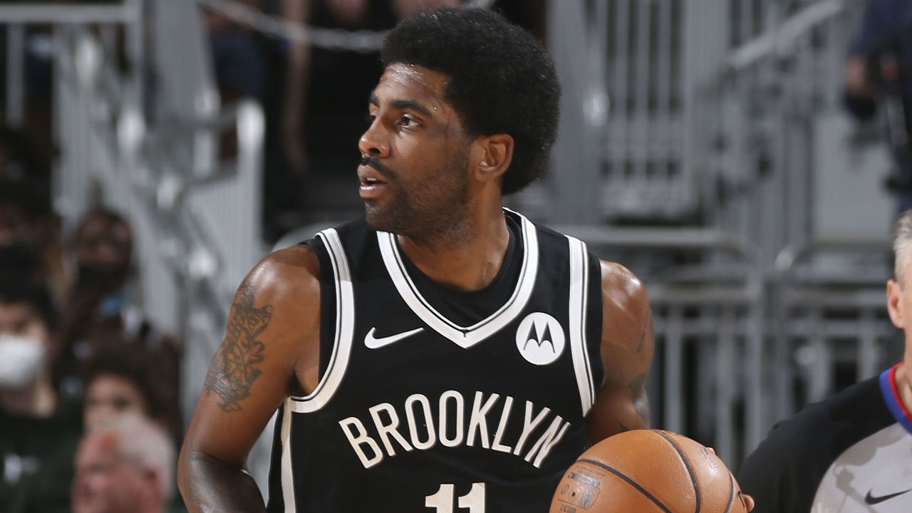 MILWAUKEE, WI - JUNE 13: Kyrie Irving #11 of the Brooklyn Nets handles the ball during the game against the Milwaukee Bucks during Round 2, Game 4 of the 2021 NBA Playoffs on June 13, 2021 at the Fiserv Forum Center in Milwaukee, Wisconsin. Mandatory Copyright Notice: Copyright 2021 NBAE .