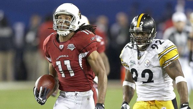 Football: Super Bowl XLIII: Arizona Cardinals Larry Fitzgerald (11) in action, scoring touchdown Pittsburgh Steelers James Harrison (92) during 4th quarter. Tampa, FL 2/1/2009 CREDIT: Walter Iooss Jr.
