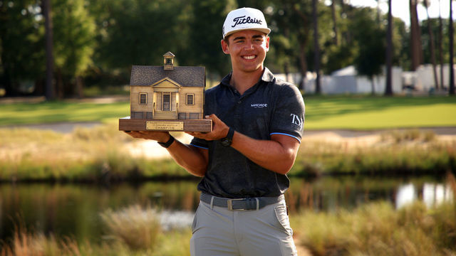 RIDGELAND, SOUTH CAROLINA - JUNE 13: Garrick Higgo of South Africa poses with the trophy after winning on the 18th green during the final round of the Palmetto Championship at Congaree on June 13, 2021 in Ridgeland, South Carolina.