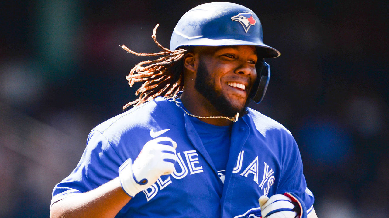 BOSTON, MA - JUNE 13: Vladimir Guerrero Jr. #27 of the Toronto Blue Jays celebrates after hitting a two-run home run in the seventh inning against the Boston Red Sox at Fenway Park on June 13, 2021 in Boston, Massachusetts.