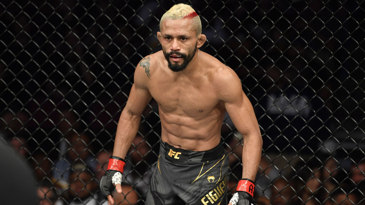 GLENDALE, ARIZONA - JUNE 12: Deiveson Figueiredo of Brazil stands in his corner between rounds of his UFC flyweight championship fight against Brandon Moreno of Mexico during the UFC 263 event at Gila River Arena on June 12, 2021 in Glendale, Arizona.