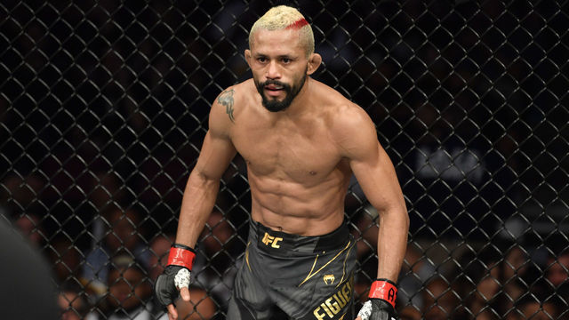 GLENDALE, ARIZONA - JUNE 12: Deiveson Figueiredo of Brazil stands in his corner between rounds of his UFC flyweight championship fight against Brandon Moreno of Mexico during the UFC 263 event at Gila River Arena on June 12, 2021 in Glendale, Arizona.