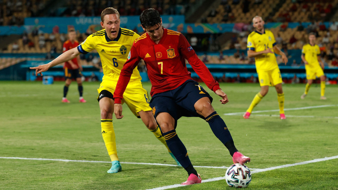 SEVILLE, SPAIN - JUNE 14: Alvaro Morata of Spain fails to keep the ball in play as he is closed down by Ludwig Augustinsson of Sweden during the UEFA Euro 2020 Championship Group E match between Spain and Sweden at the La Cartuja Stadium on June 14, 2021 in Seville, Spain.