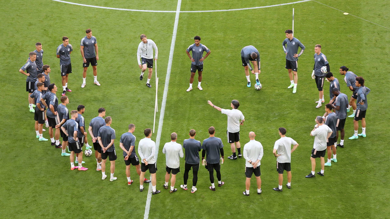 MUNICH, GERMANY - JUNE 14: Joachim Loew, Head Coach of Germany speaks to his players during the Germany Training Session ahead of the Euro 2020 Group F match between France and Germany at Fussball Arena Muenchen on June 14, 2021 in Munich, Germany.