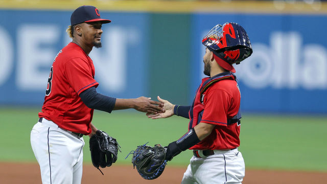 CLEVELAND, OH - JUNE 14: Cleveland Indians pitcher Emmanuel Clase (48) is congratulated by Cleveland Indians catcher Rene Rivera (46) following the Major League Baseball game between the Baltimore Orioles and Cleveland Indians on June 14, 2021, at Progressive Field in Cleveland, OH.
