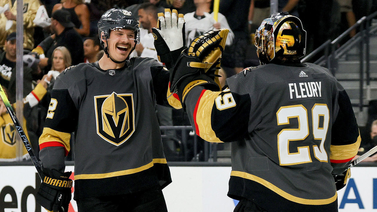 LAS VEGAS, NEVADA - JUNE 14: Nick Holden #22 of the Vegas Golden Knights is congratulated by Marc-Andre Fleury #29 after scoring a goal against the Montreal Canadiens during the third period in Game One of the Stanley Cup Semifinals during the 2021 Stanley Cup Playoffs at T-Mobile Arena on June 14, 2021 in Las Vegas, Nevada.