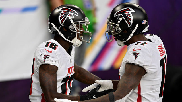MINNEAPOLIS, MINNESOTA - OCTOBER 18: Calvin Ridley #18 and Julio Jones #11 of the Atlanta Falcons celebrate after scoring a touchdown in the third quarter against the Minnesota Vikings at U.S. Bank Stadium on October 18, 2020 in Minneapolis, Minnesota.