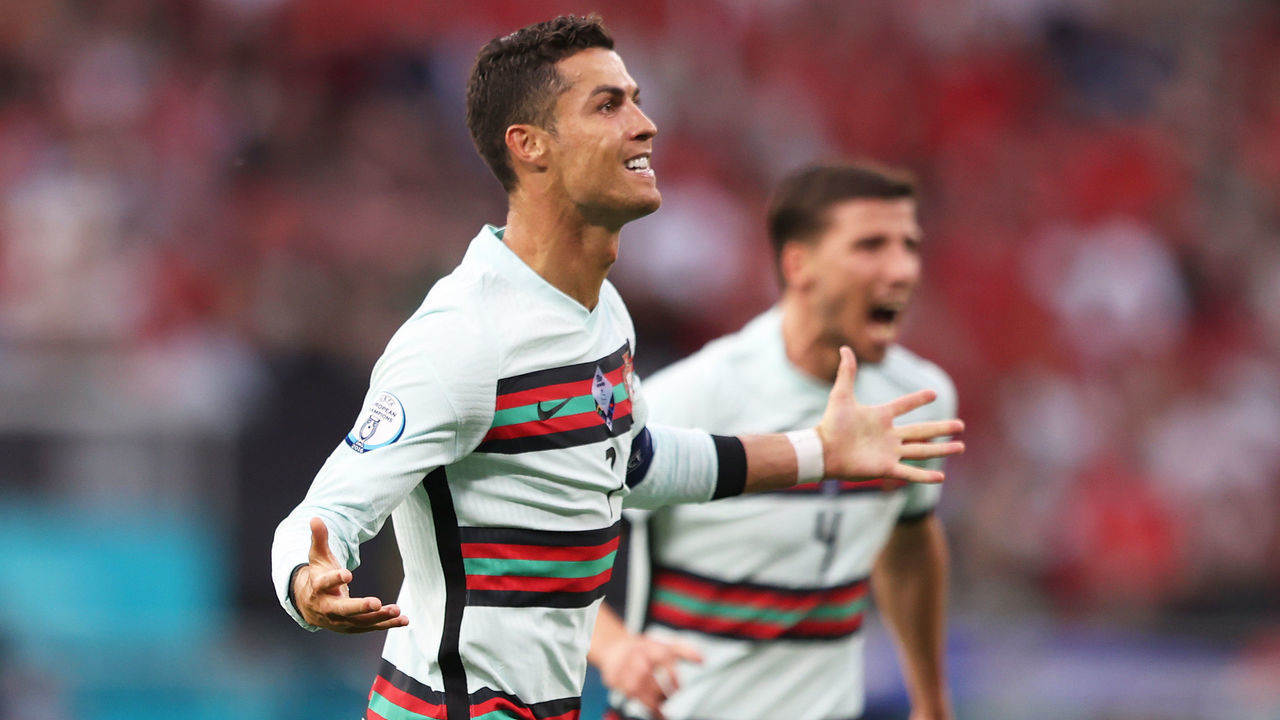 BUDAPEST, HUNGARY - JUNE 15: Cristiano Ronaldo of Portugal celebrates after scoring their side's third goal during the UEFA Euro 2020 Championship Group F match between Hungary and Portugal at Puskas Arena on June 15, 2021 in Budapest, Hungary.