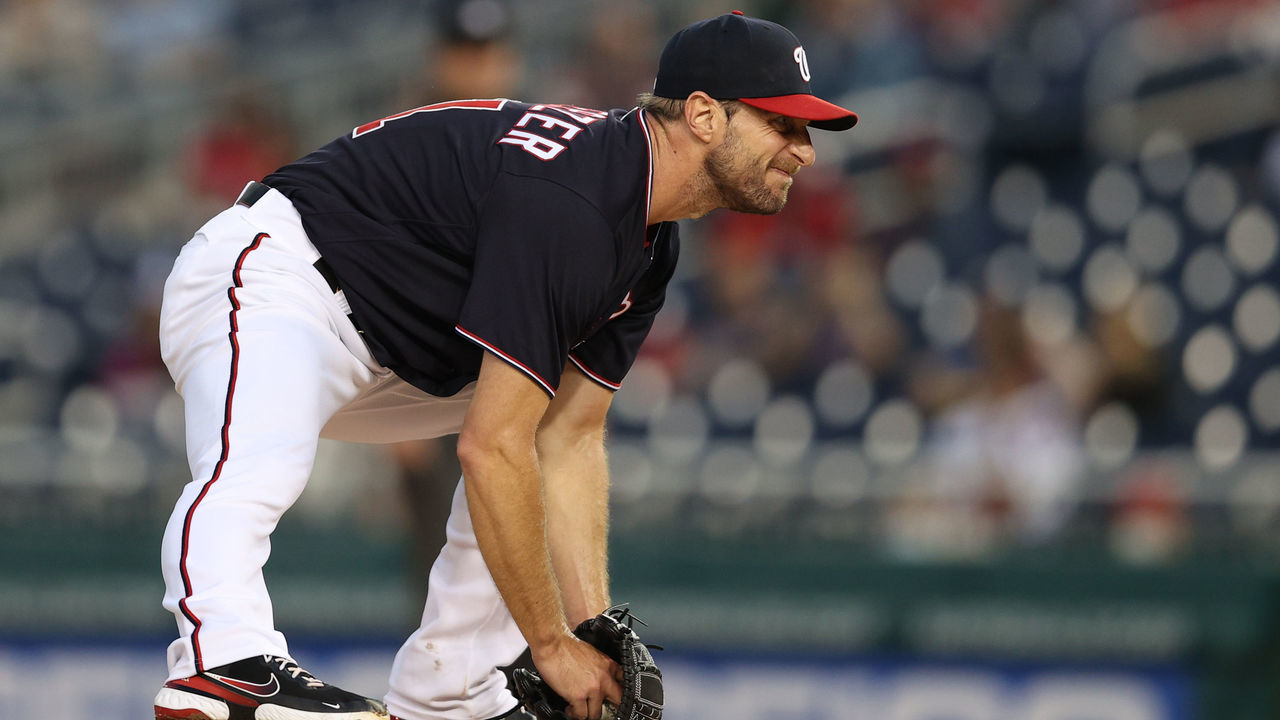 WASHINGTON, DC - JUNE 11: Starting pitcher Max Scherzer #31 of the Washington Nationals stretches on the mound after a pitch in the first inning against the San Francisco Giants at Nationals Park on June 11, 2021 in Washington, DC.