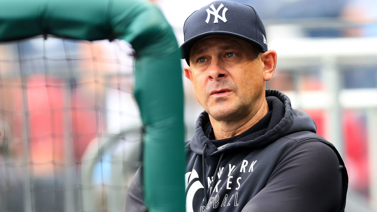 PHILADELPHIA, PA - JUNE 12: Manager Aaron Boone #17 of the New York Yankees in the dugout during a game against the Philadelphia Phillies at Citizens Bank Park on June 12, 2021 in Philadelphia, Pennsylvania.